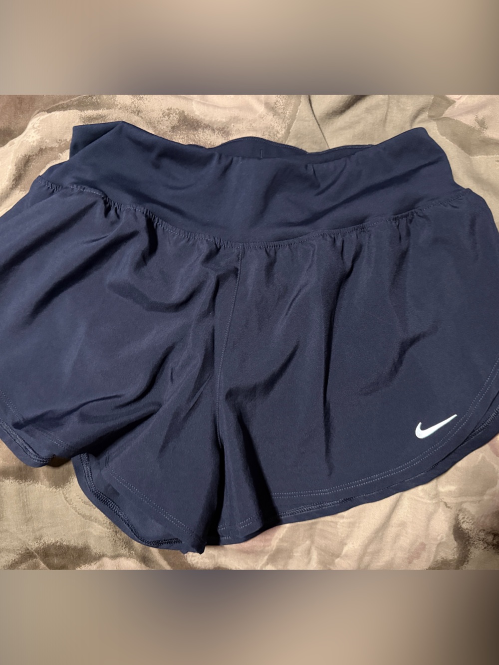 Nike Women's Navy Blue Athletic Shorts with Silver Swoosh
